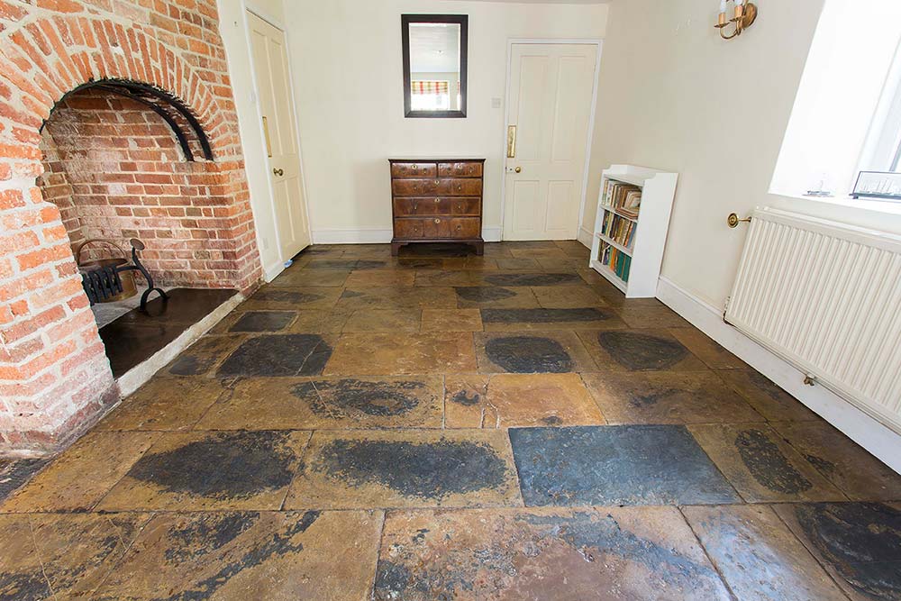 Restored flagstone floor in Colyton, Devon after cleaning and re-pointing